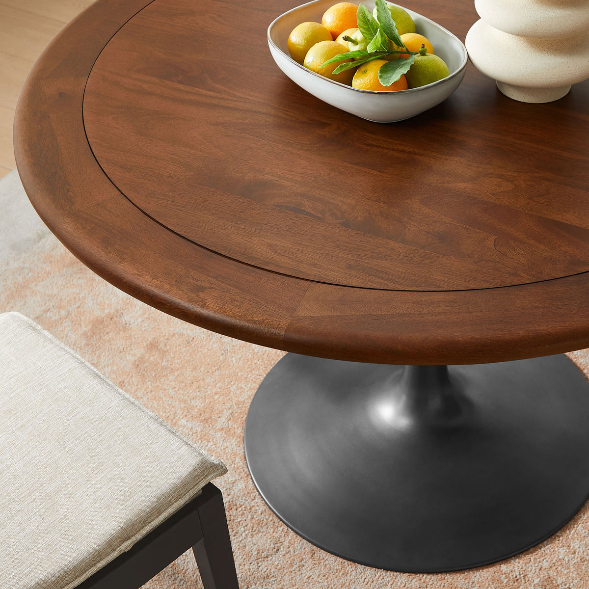Warm black walnut mango wood tabletop styled with fruit bowl and decor on a soft neutral rug. || EEI-7070-BLK-WAL || detail_room