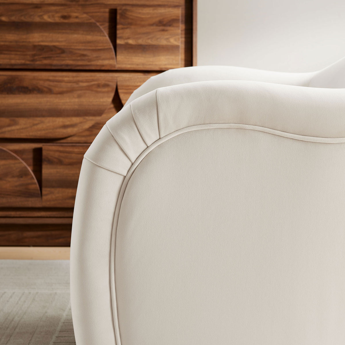 Elegant pleated seam and piping bring sculptural texture to the alabaster velvet upholstery || EEI-7074-ALA || detail_room