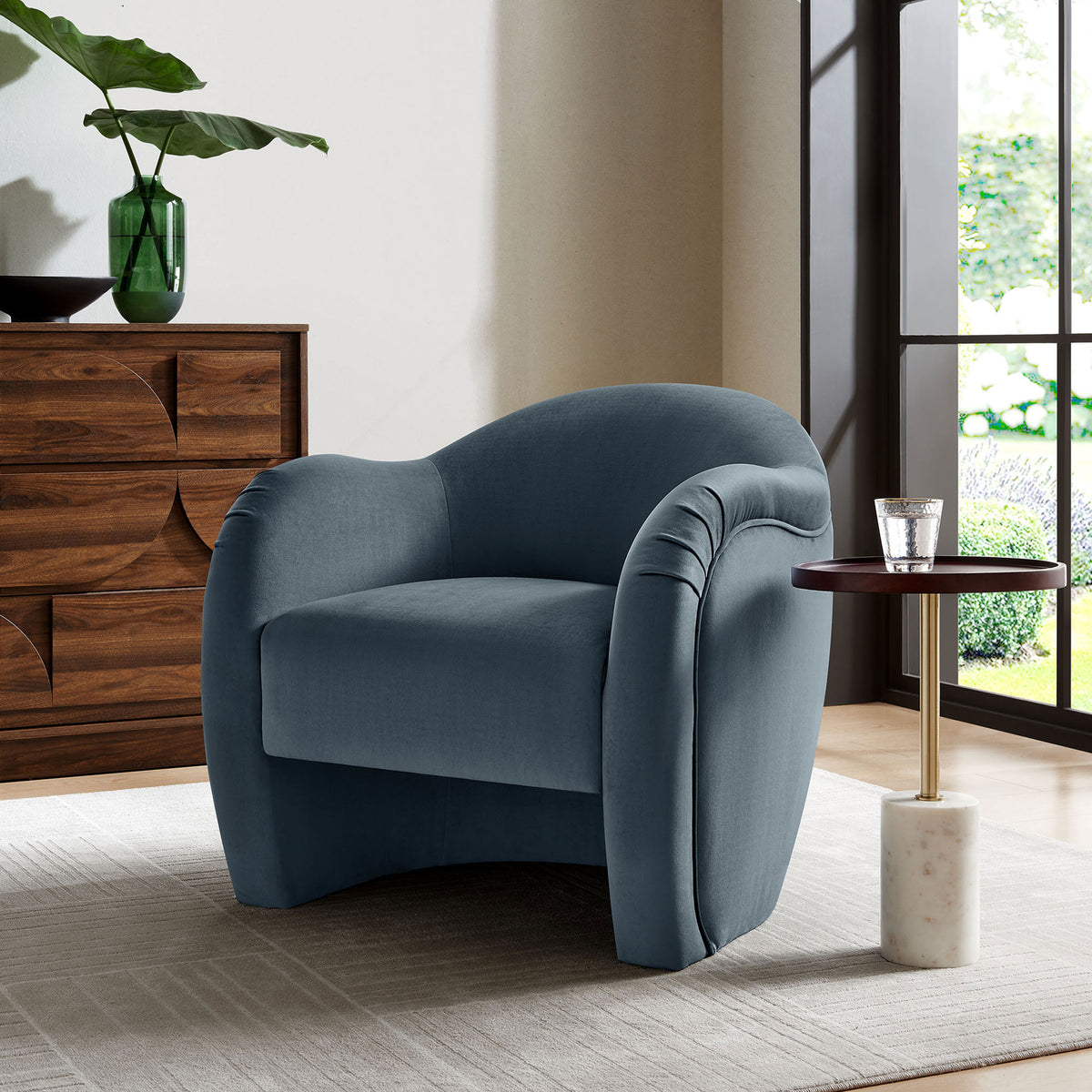 Inviting lounge chair brings soft cadet blue velvet and cozy curves to your living space || EEI-7074-CAB || front_angle_room