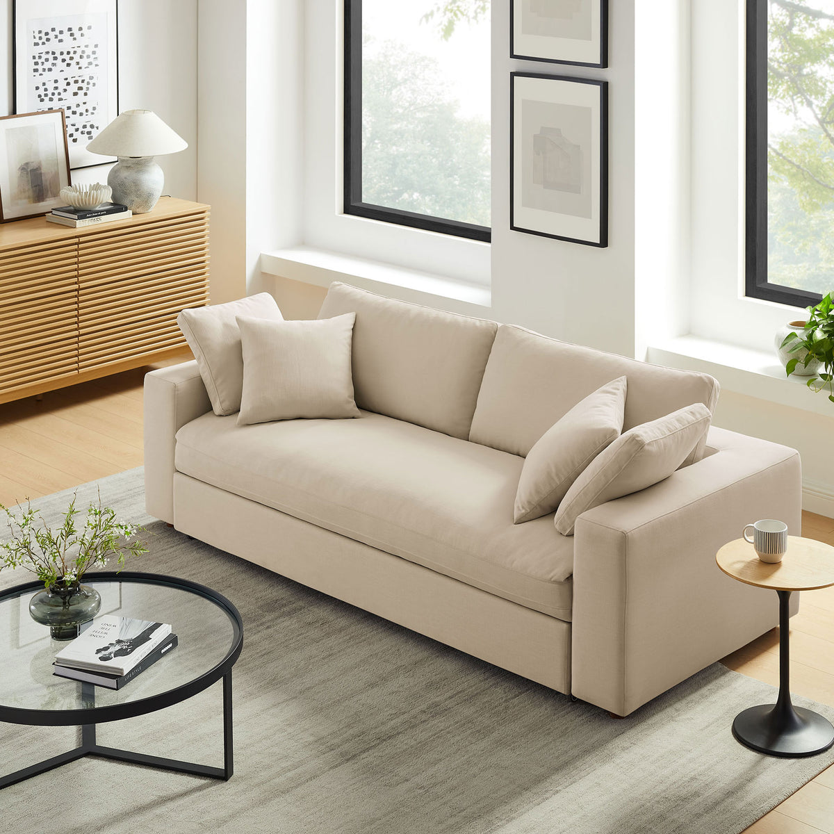 Light beige sleeper sofa styled in a modern living room with neutral decor and soft natural light || EEI-7080-LBG || front_angle_room