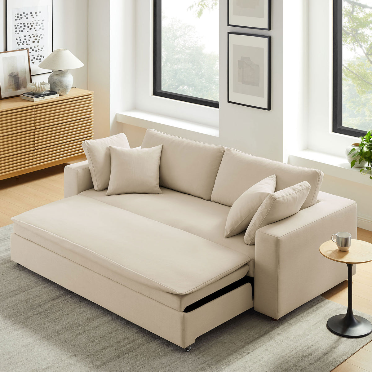 Sleeper sofa converted into a smooth extended lounge surface, blending seamlessly with the seat cushions || EEI-7080-LBG || front_angle_converted_room