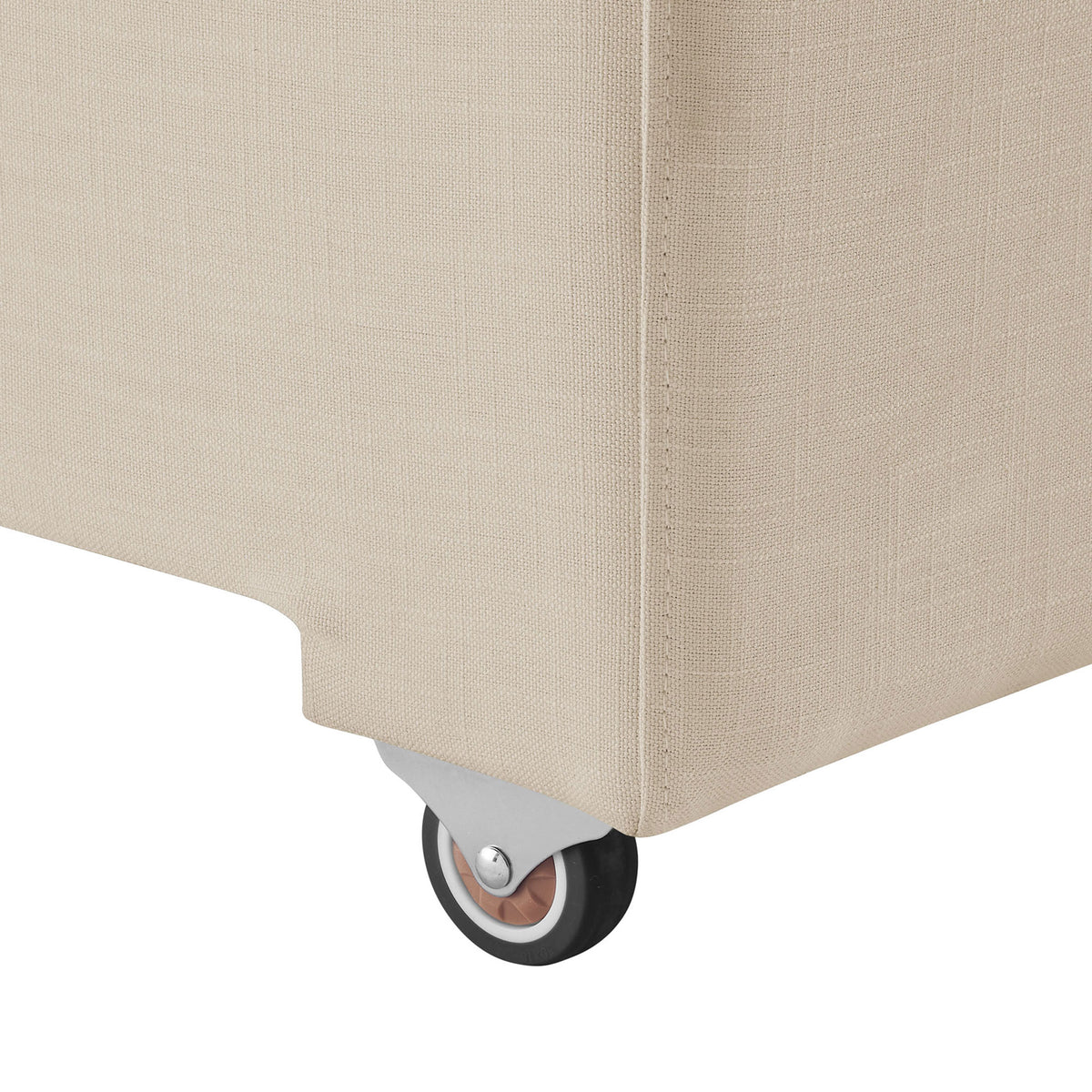 Close-up of the smooth-rolling caster tucked beneath the upholstered base for easy pull-out || EEI-7080-LBG || leg_studio