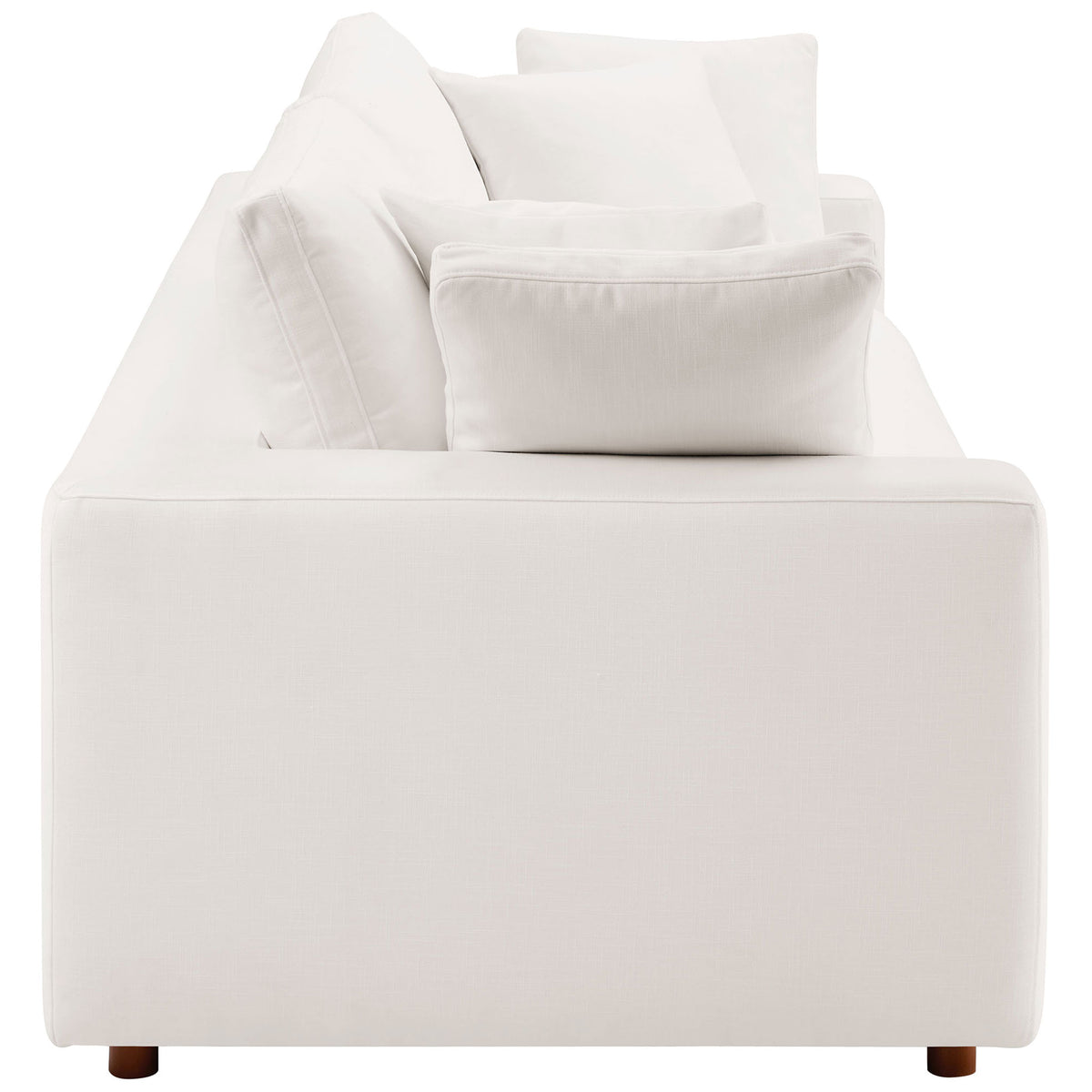 Boxy arm and plush layered cushions showcase the generous depth of this pure white sleeper sofa || EEI-7080-PUW || side_studio