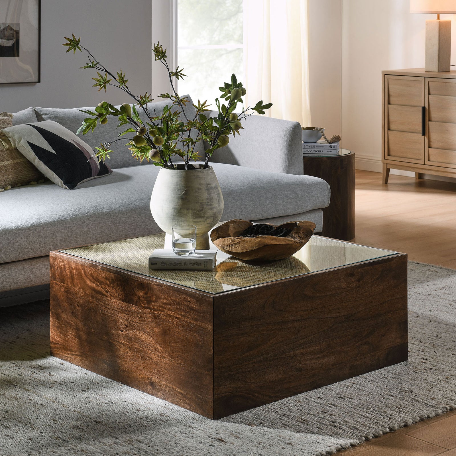 Low-profile square coffee table in walnut with rattan cane under tempered glass || EEI-7086-WAL || front_angle_room