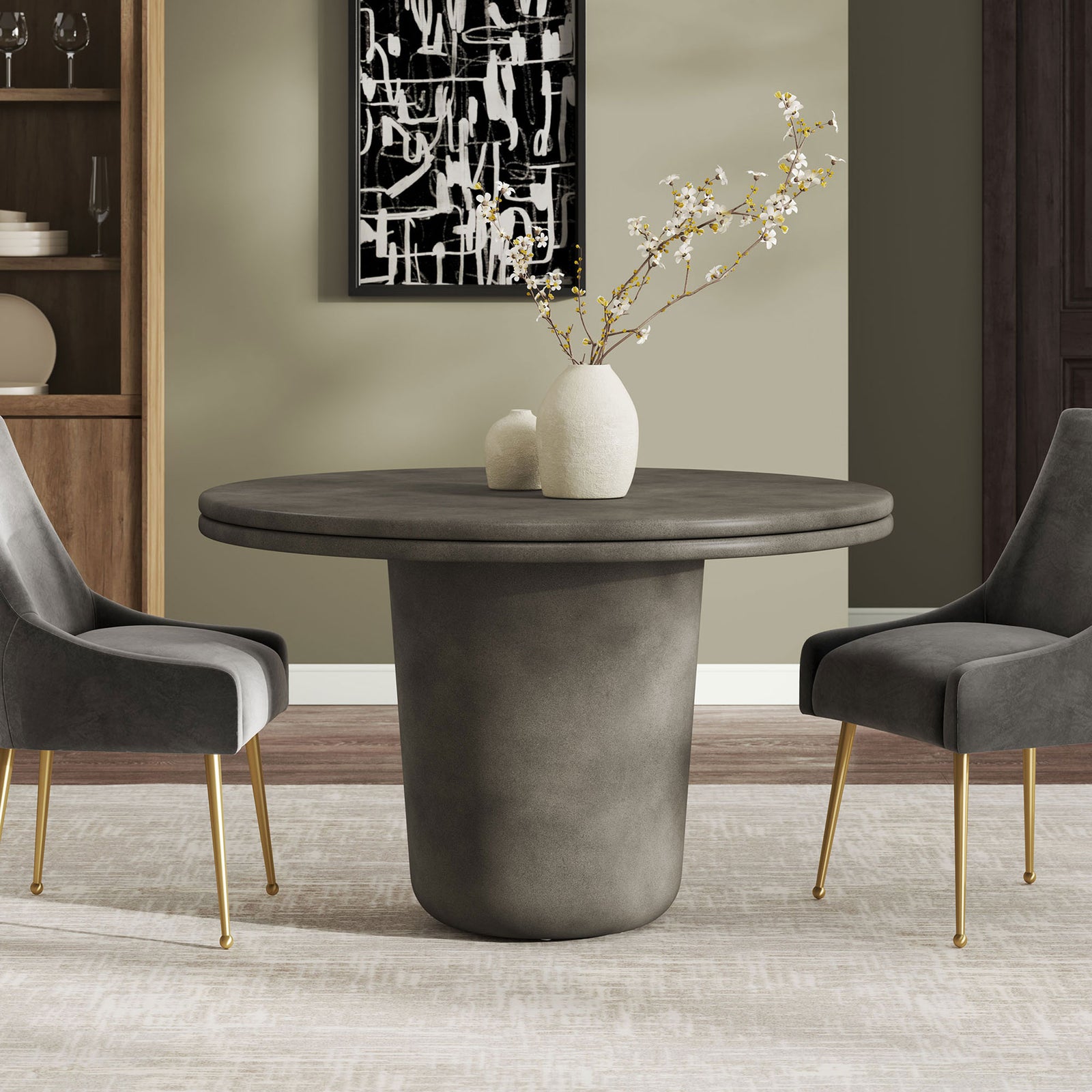 Gray concrete round dining table paired with upholstered chairs in a modern dining room || EEI-7087-GRY || front_angle_room