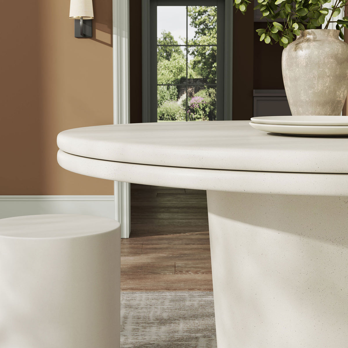 White concrete tabletop and pedestal base styled indoors, showcasing sleek finish and modern profile || EEI-7087-WHI || detail_room