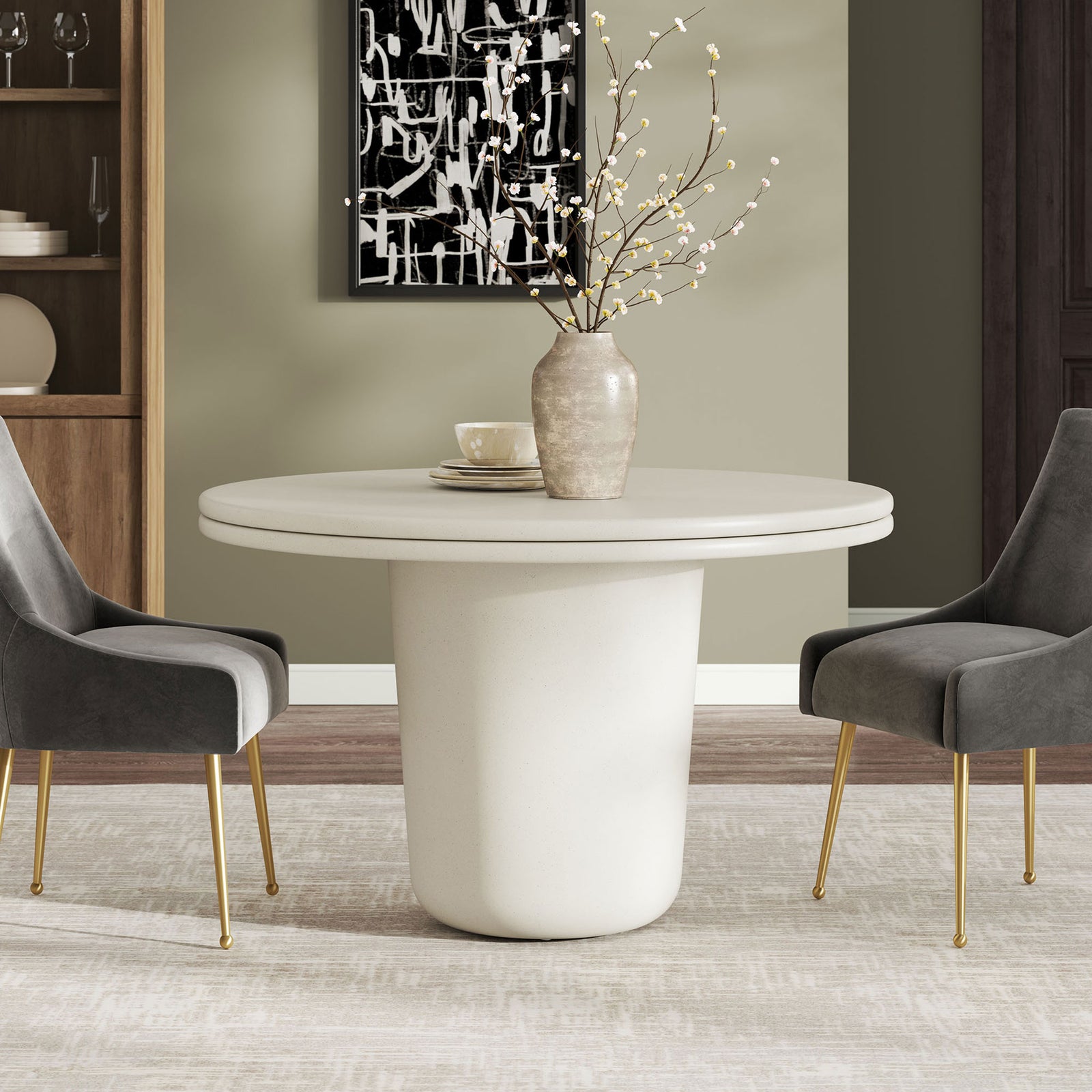 White concrete round dining table paired with upholstered chairs in a modern dining room || EEI-7087-WHI || front_angle_room
