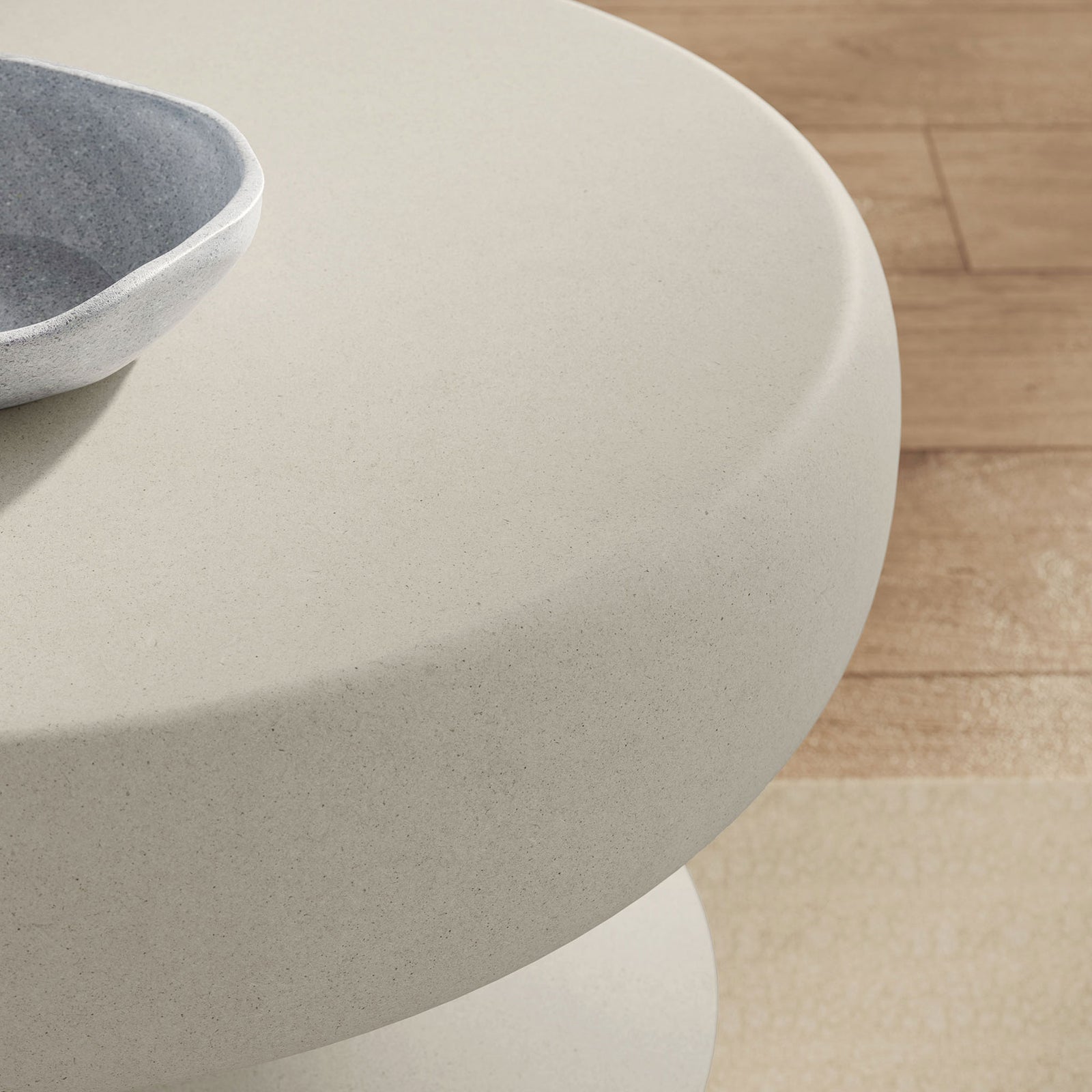 Light gray concrete tabletop styled with a ceramic bowl, adding soft modern texture to the space || EEI-7090-LGR || detail_room