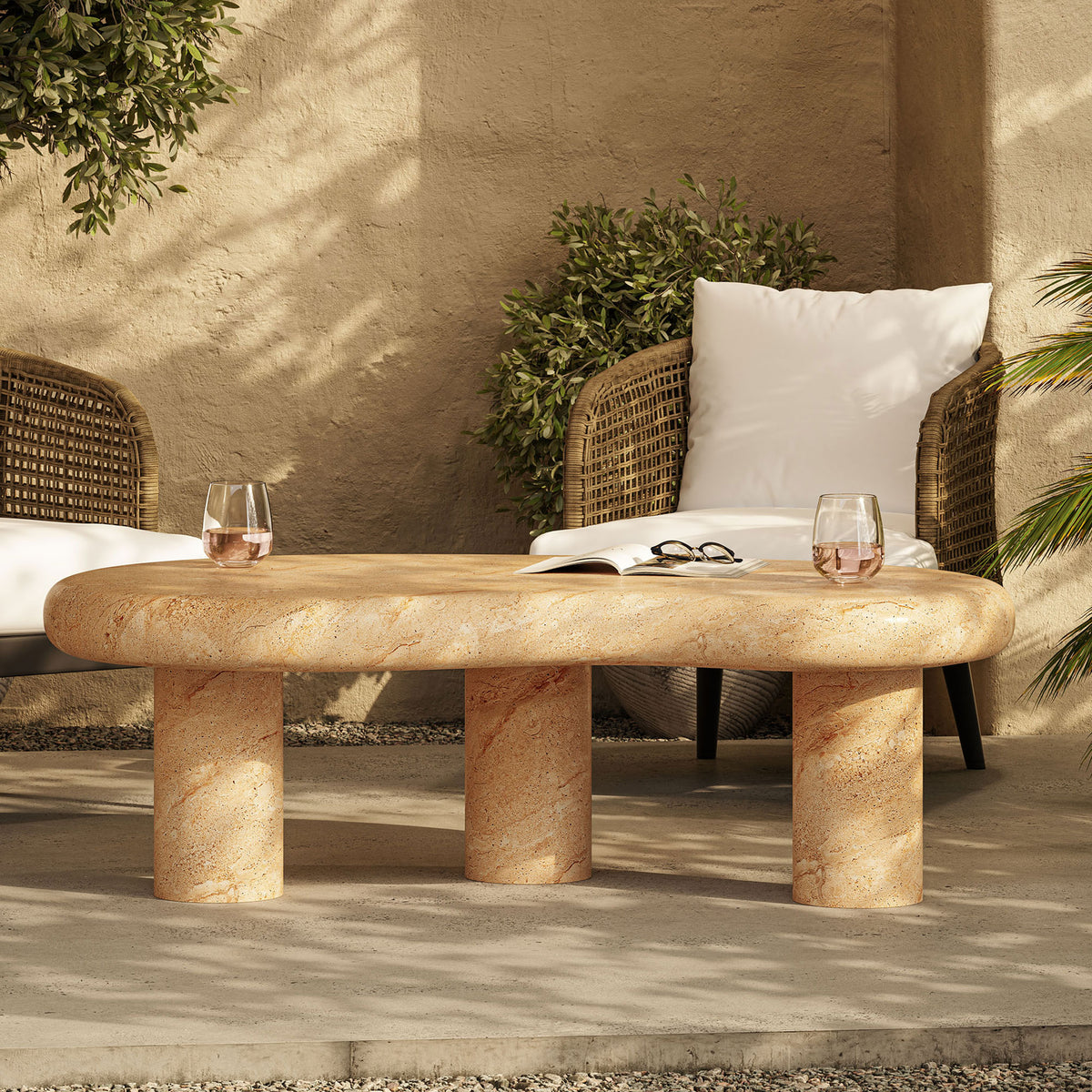 Elowen faux travertine coffee table completes a relaxed patio vignette with two lounge chairs and drinks || EEI-7093-TRV || front_room