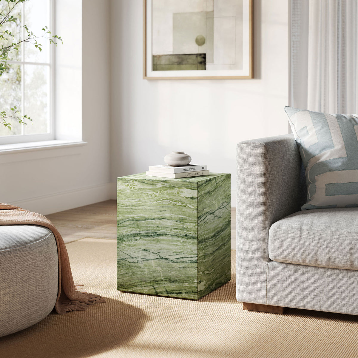 Green marble-effect cube side table anchoring a modern living room seating area with soft neutral tones. || EEI-7096-GRN || front_angle_room