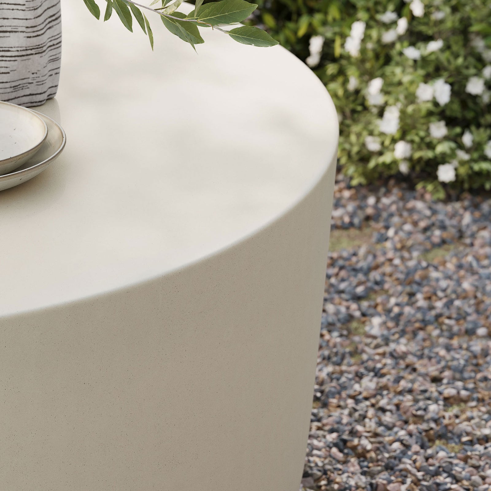 White concrete tabletop styled with greenery and serveware to highlight its weather-resistant design || EEI-7099-WHI || detail_room