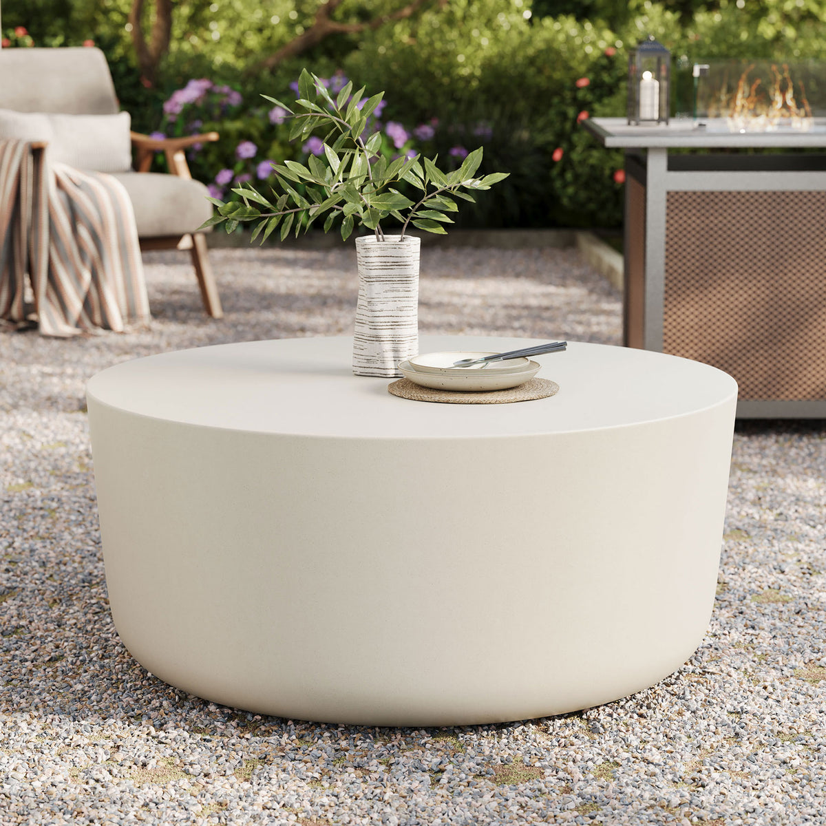 Outdoor patio setup featuring the white concrete coffee table as a bright modern focal point || EEI-7099-WHI || front_angle_room
