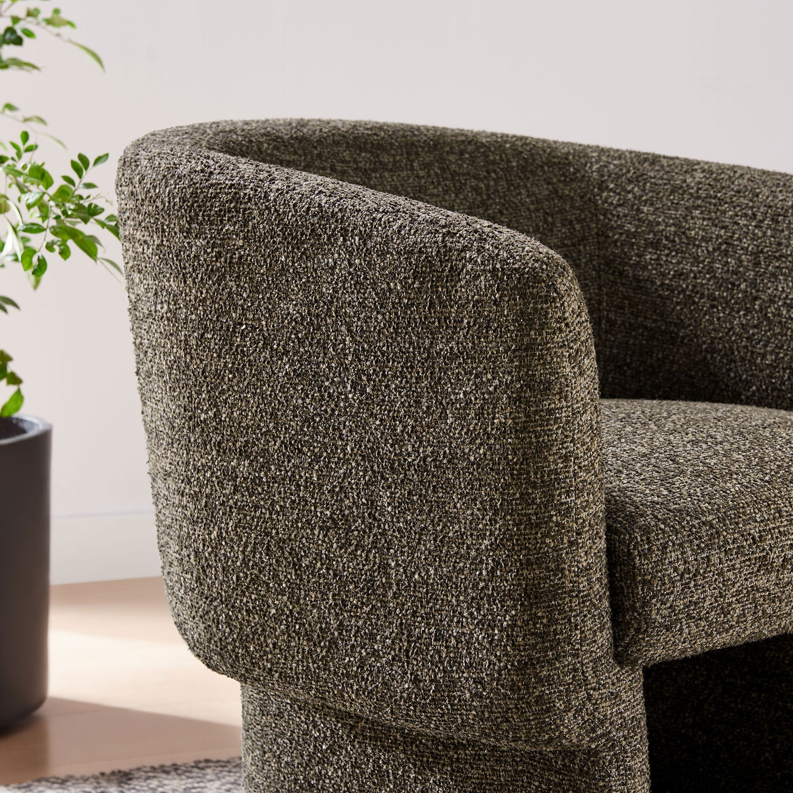 Plush boucle upholstery and softly contoured arm for everyday comfort || EEI-7100-ATQ || detail_room
