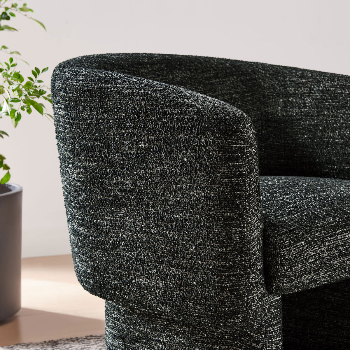 Textured boucle and gently flared arm lend a warm, tactile look || EEI-7100-CHA || detail_room