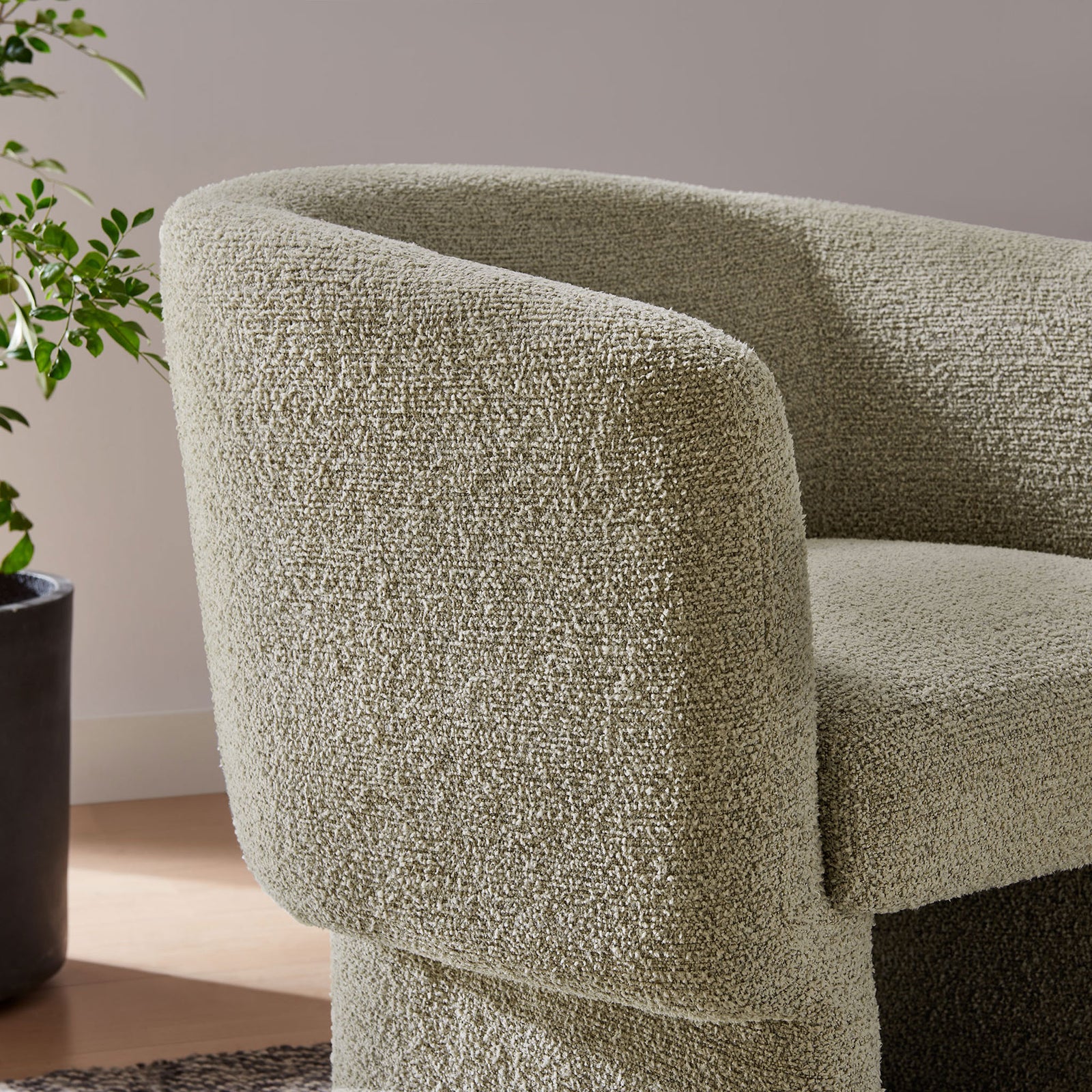 Nubby boucle texture and rounded arm detail add cozy warmth and tactile appeal || EEI-7100-CRK || detail_room