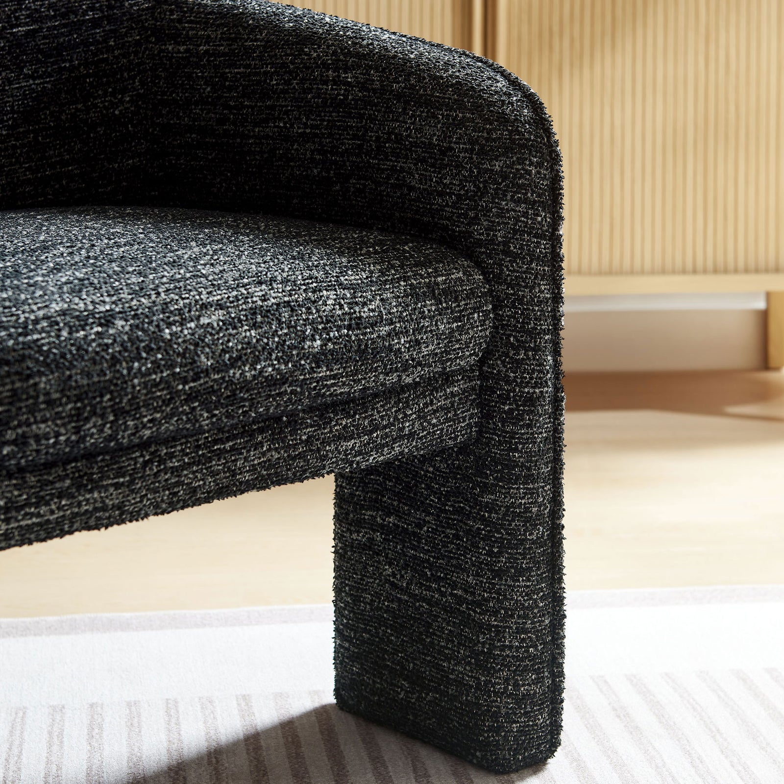 Plush seat edge and thick leg showcase boucle texture and rounded contours || EEI-7101-CHA || leg_room