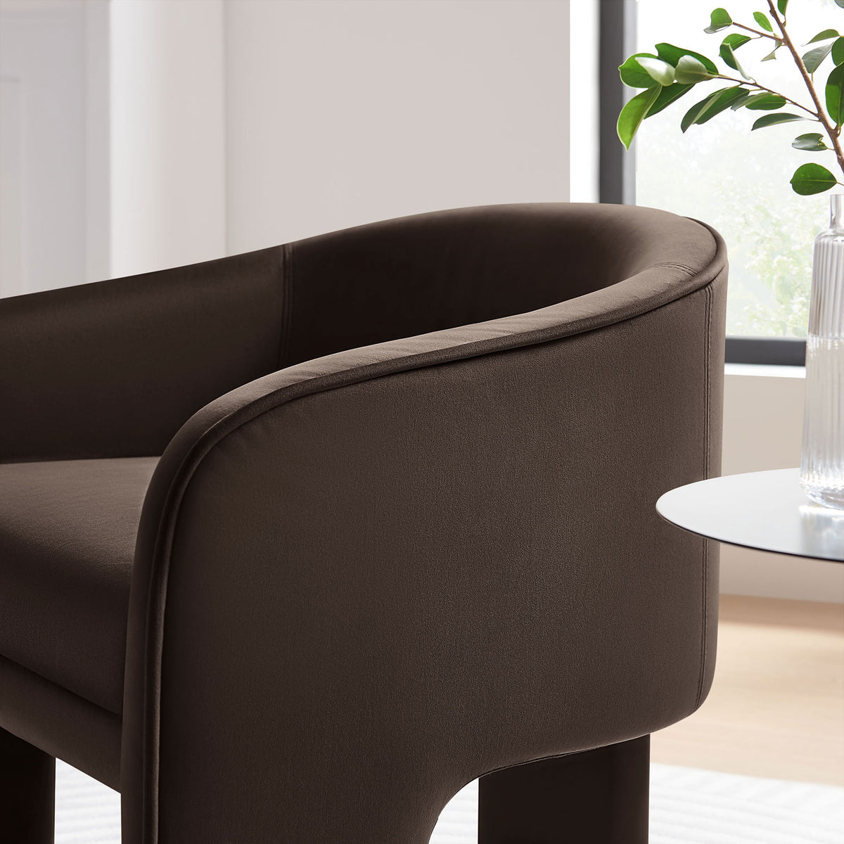 Velvet upholstery and rounded piping lend a refined touch that pairs effortlessly with modern decor || EEI-7102-CHB || detail_room