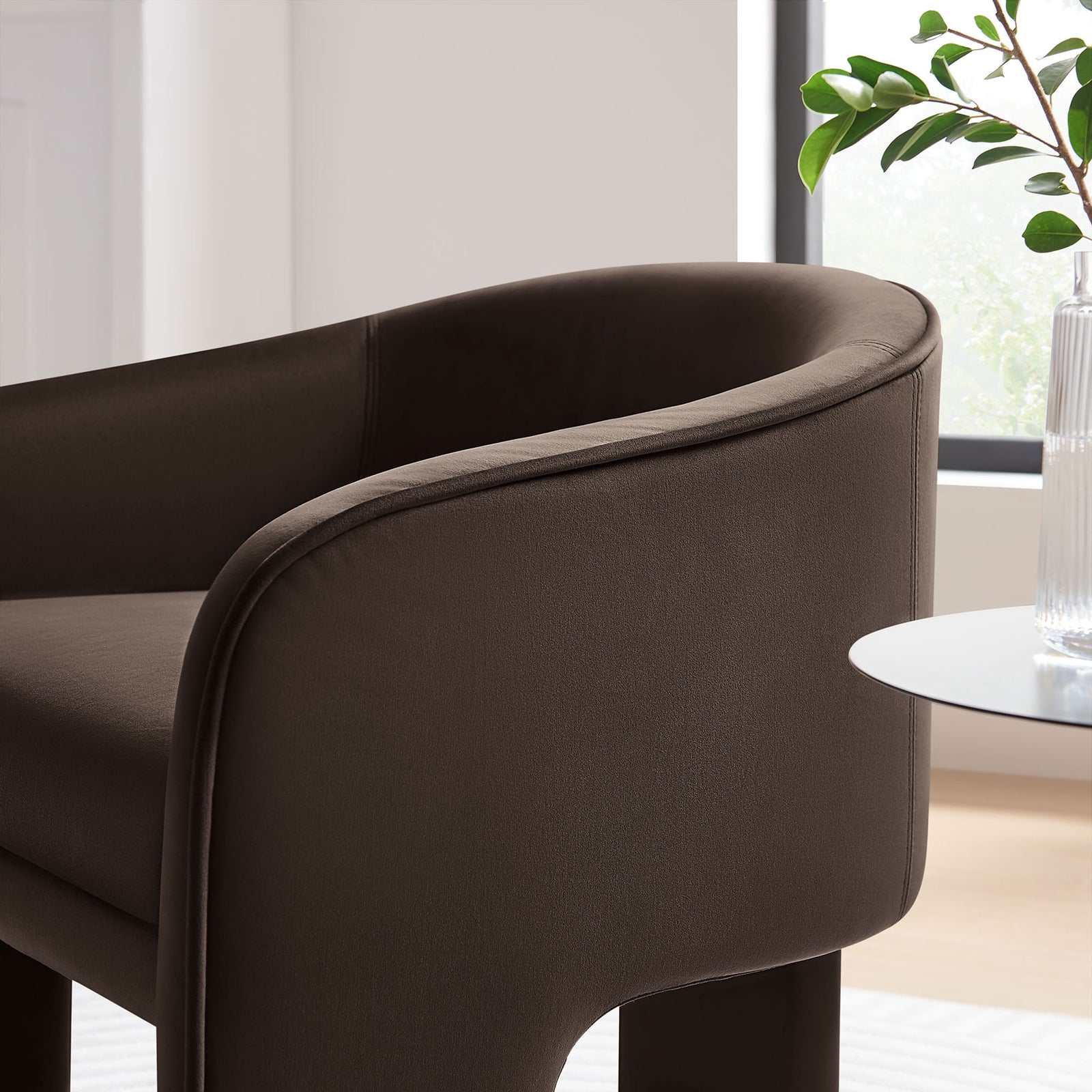 Velvet upholstery and rounded piping lend a refined touch that pairs effortlessly with modern decor || EEI-7102-CHB || detail_room