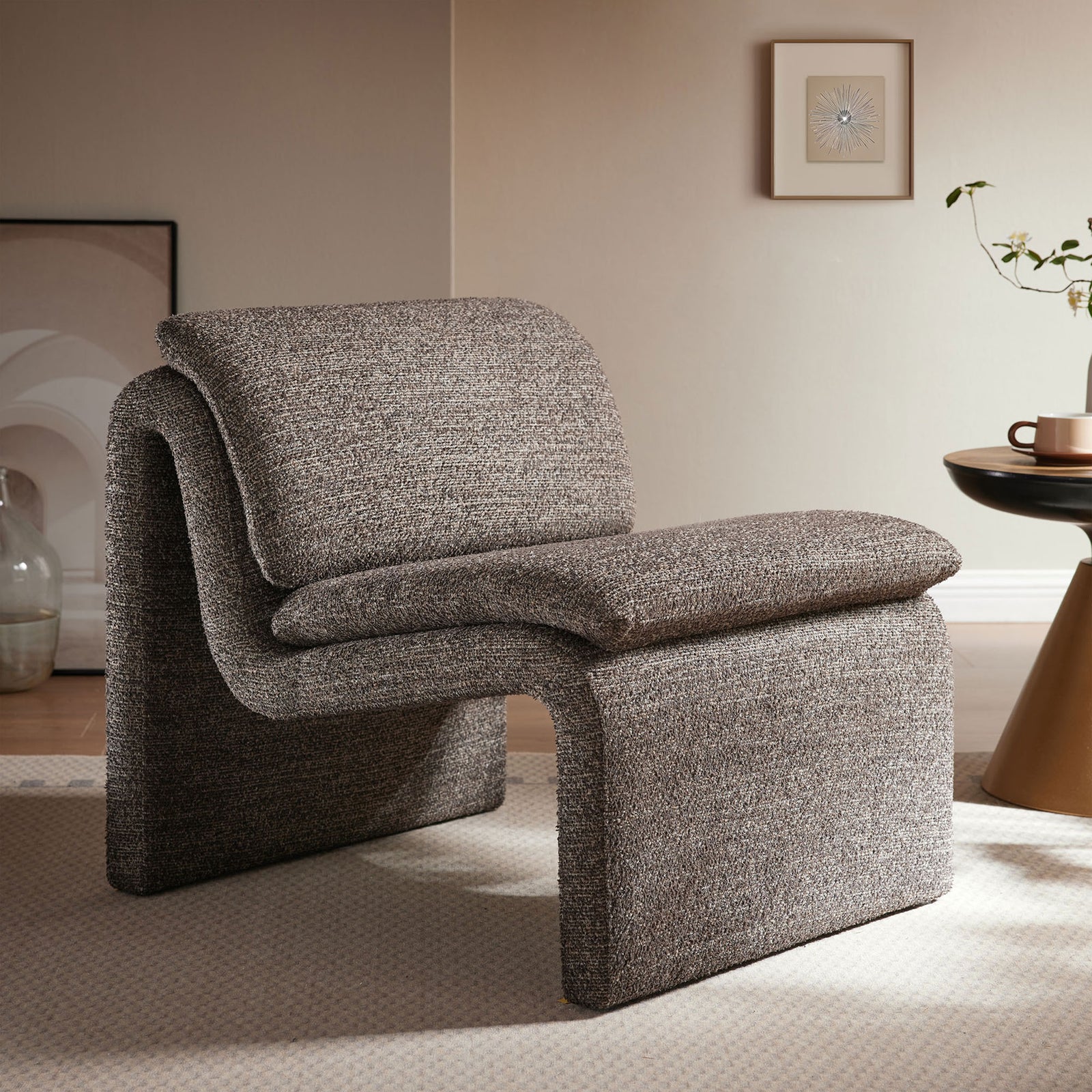 Bold, continuous curves and boucle upholstery bring modern warmth to any seating area || EEI-7103-ATQ || front_angle_room
