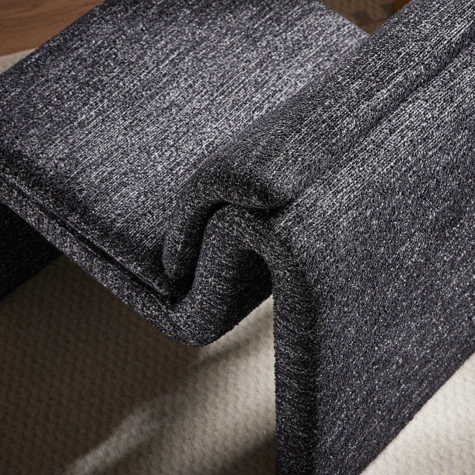 Charcoal boucle and smooth contours bring cozy texture and statement-making style to your space. || EEI-7103-CHA || detail_room
