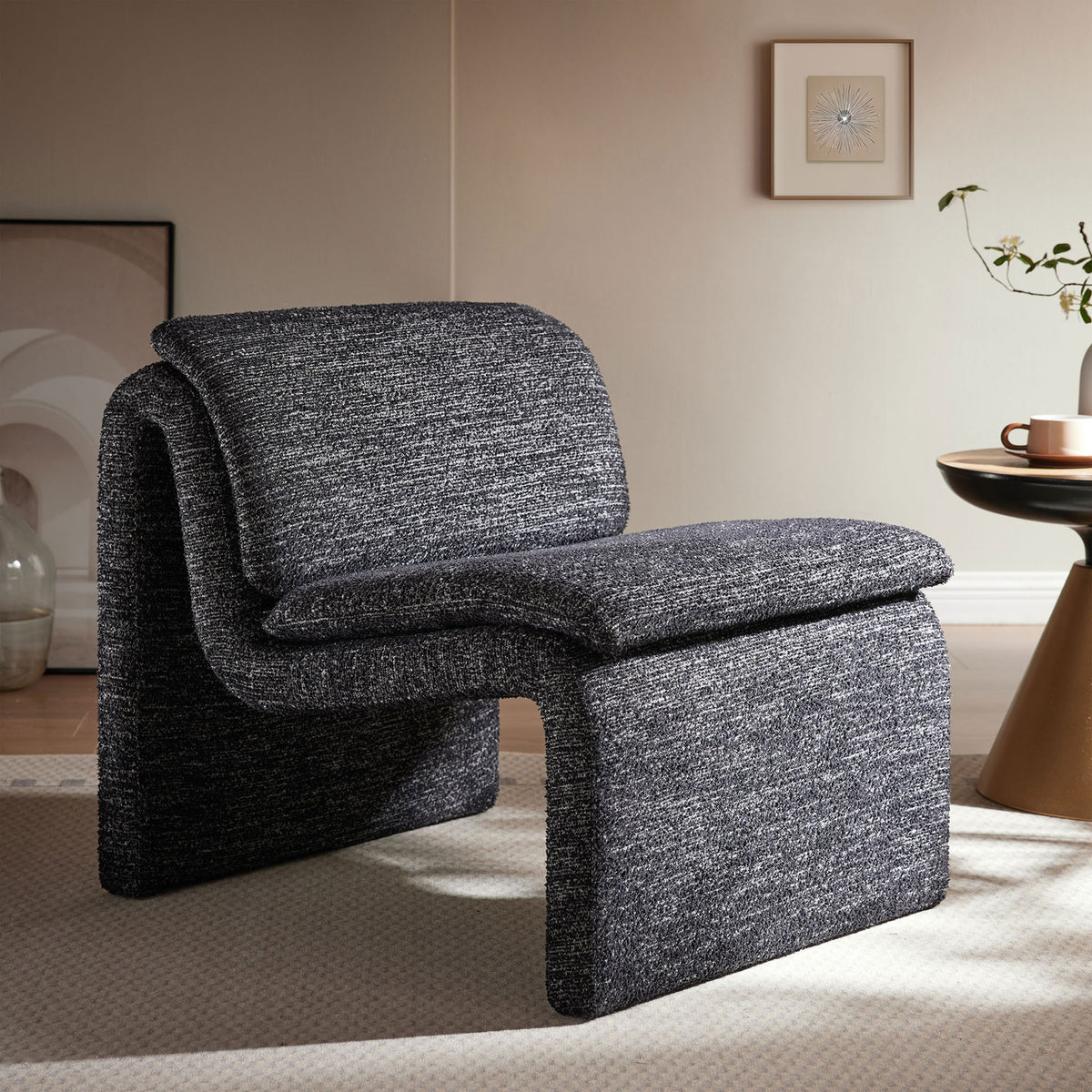 Statement armless chair elevates the room with cozy boucle, rounded lines, and inviting comfort. || EEI-7103-CHA || front_angle_room