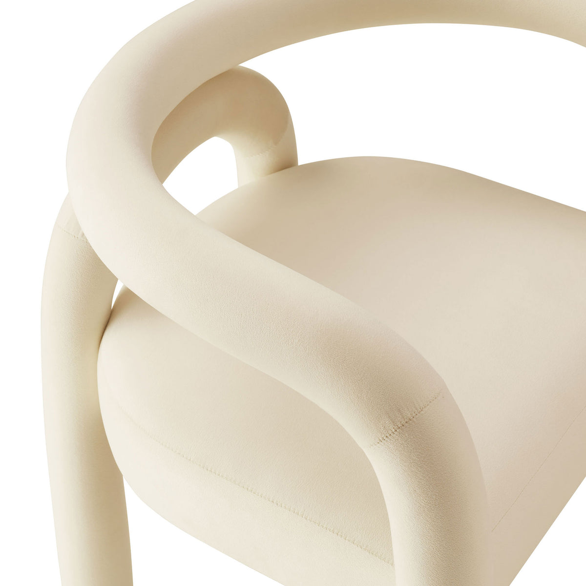 Close-up of curved tubular arm and smooth velvet seat on porcelain barrel dining chair || EEI-7104-POR || detail_studio