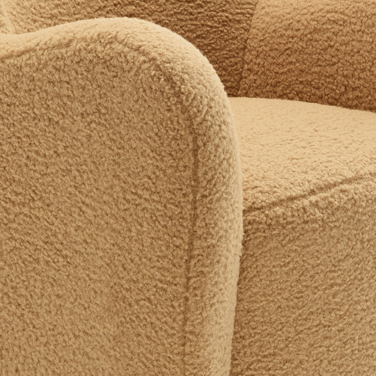 Plush teddy sherpa texture and softly rounded arm showcase inviting, sink-in comfort || EEI-7105-CAM-WAL || detail_studio