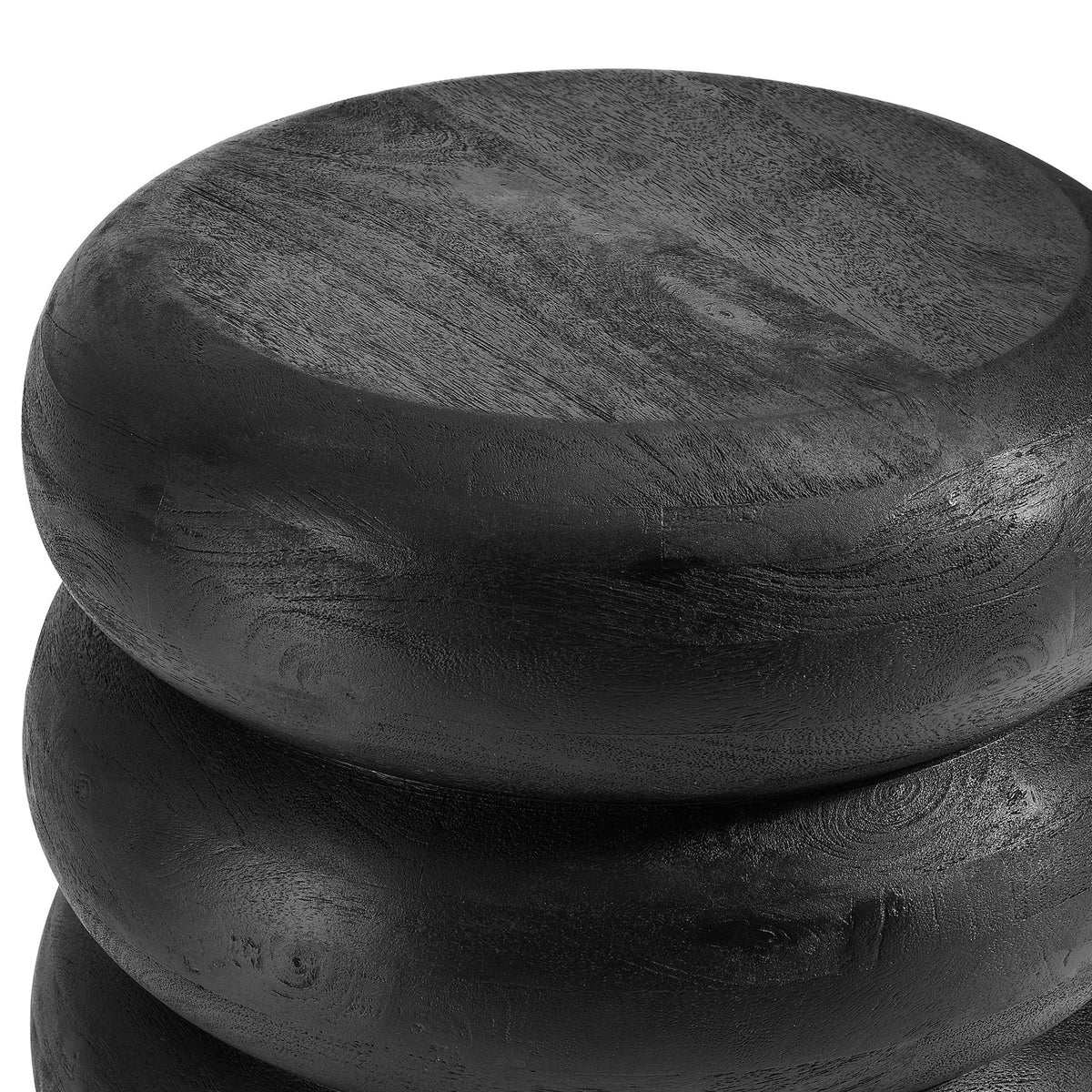 Textured black mango wood tabletop with visible grain above rounded stacked base || EEI-7106-BLK || detail_studio