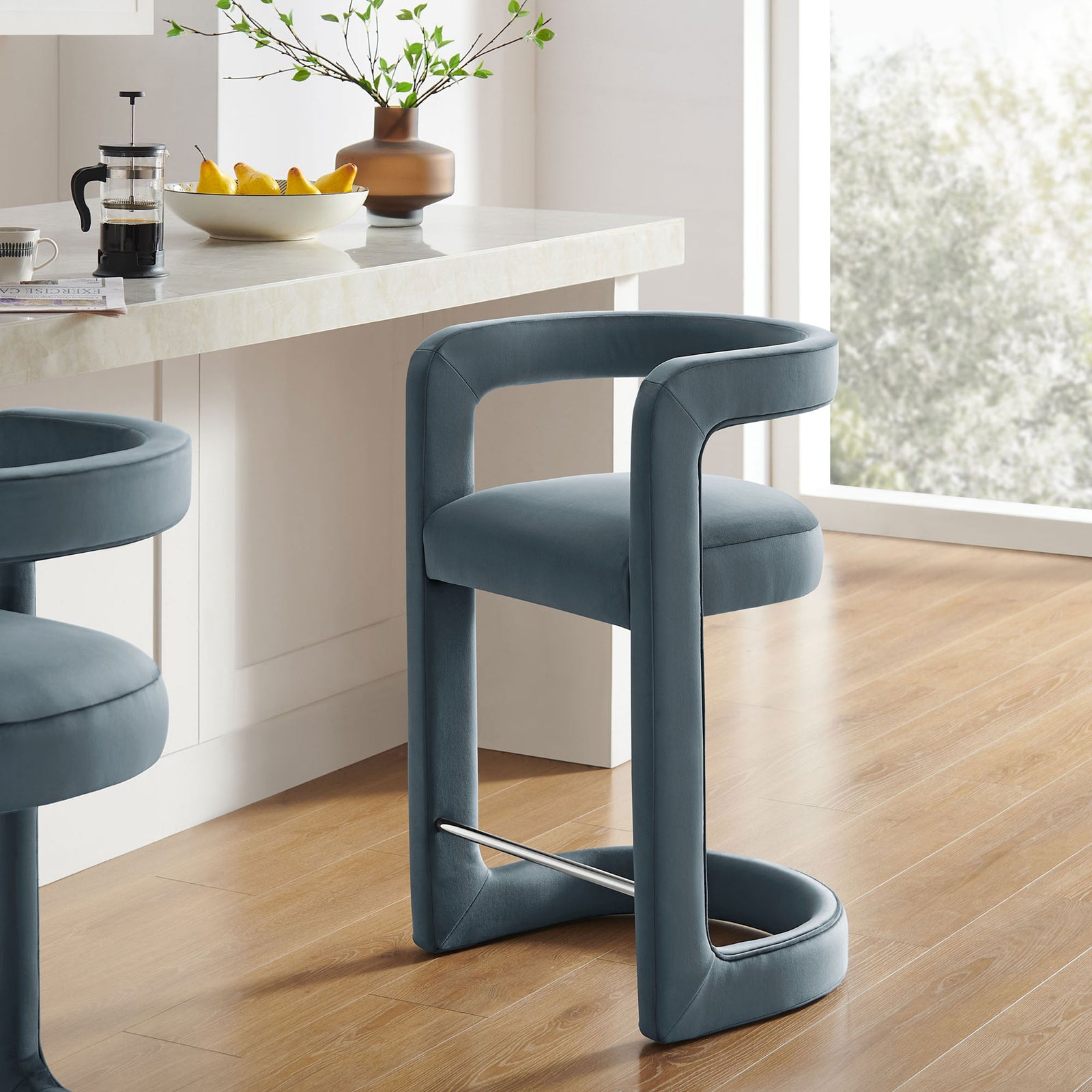 Velvet counter stool brings modern curves and cadet blue tone to the kitchen || EEI-7107-CAB || front_angle_room
