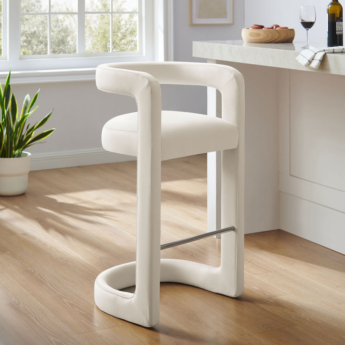 Bar-height stool with arched base and polished footrest suits contemporary spaces || EEI-7108-ALA || front_angle_room