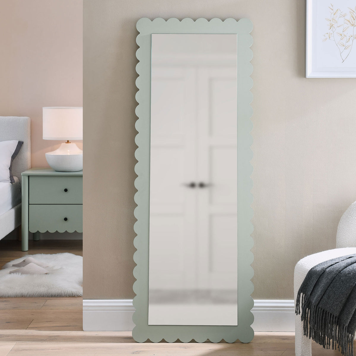Sage scalloped floor mirror styling a cozy bedroom with coordinating modern nightstand || EEI-7117-SGE || front_room