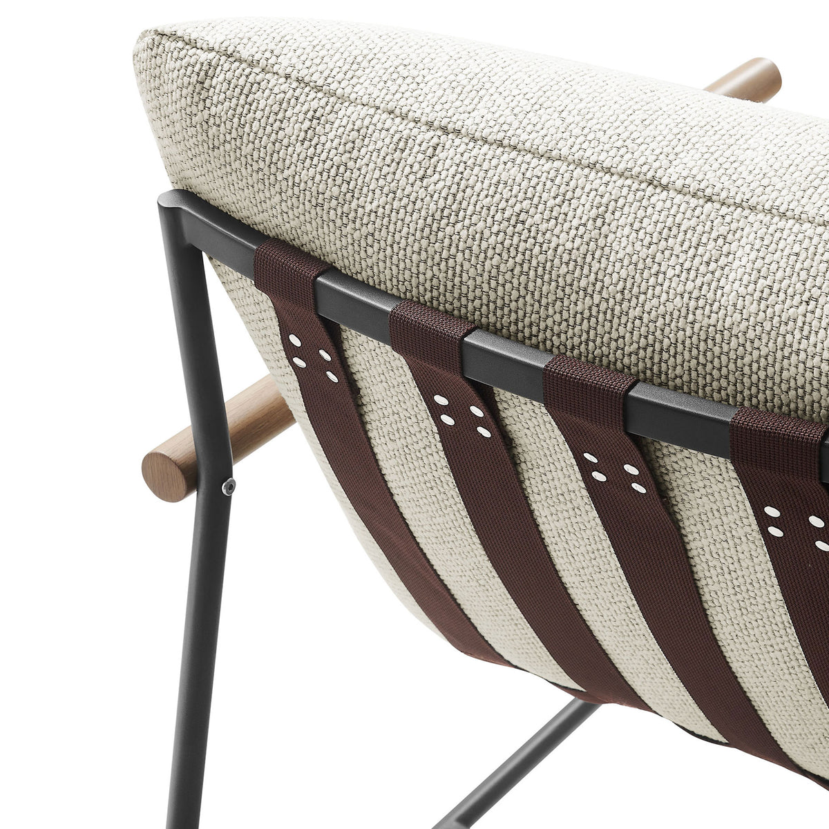 Ivory boucle cushion paired with wide brown poly sling straps and black metal frame detailing || EEI-7118-IVO || detail_studio