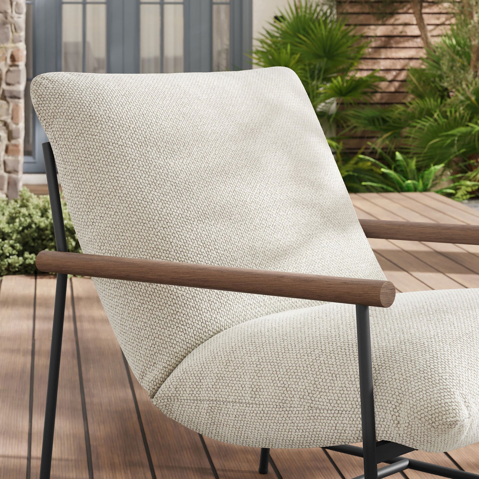Ivory boucle lounge chair arm and cushion bringing soft texture to an outdoor deck setting || EEI-7118-IVO || detail_room