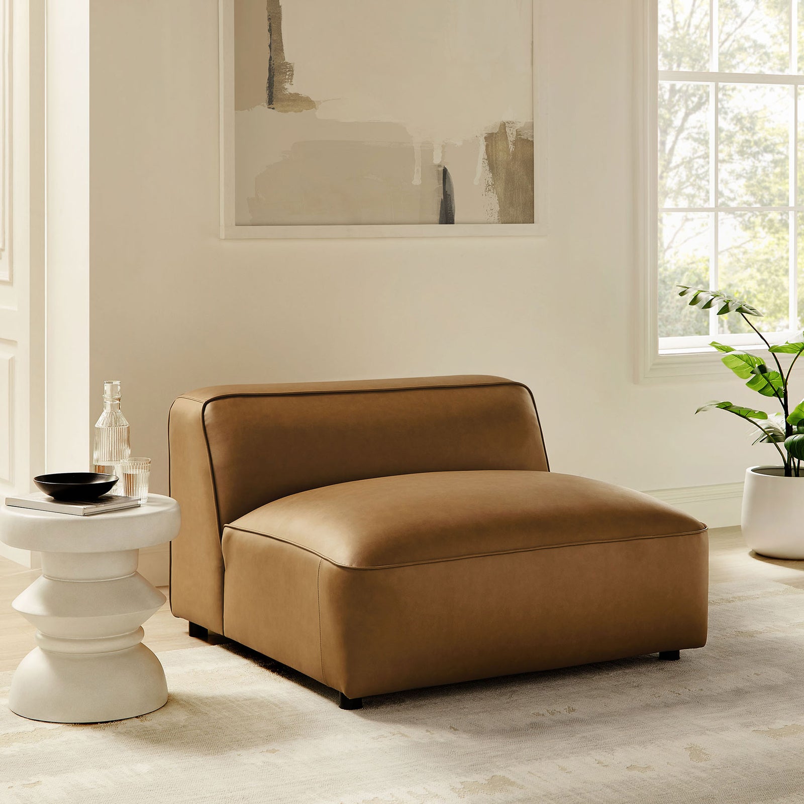 Luxe camel vegan leather chair anchors the room with generous proportions and laid-back sophistication || EEI-7121-CAM || front_angle_room
