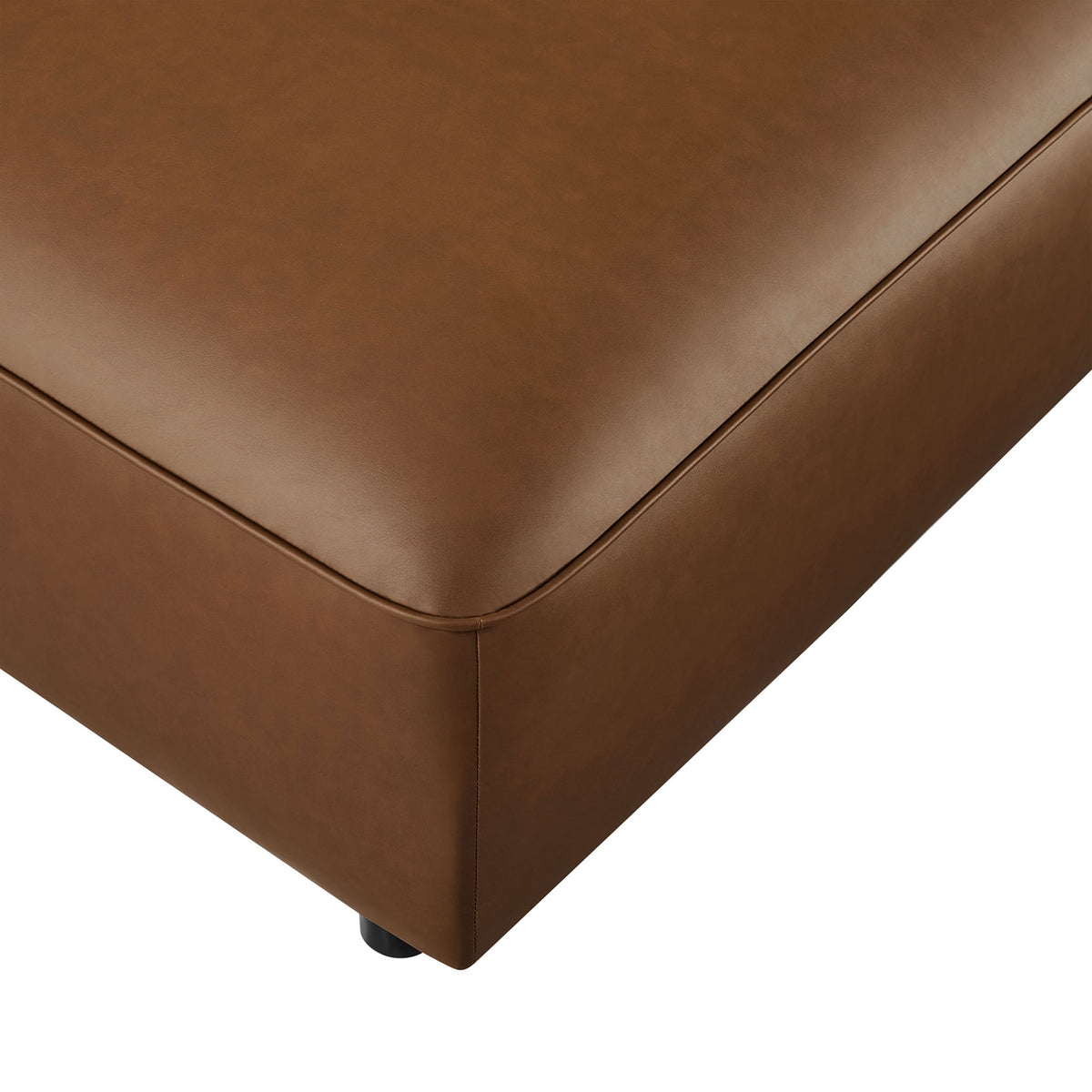 Close up of coffee vegan leather ottoman corner showcasing fine stitching and softly rounded seams || EEI-7125-COF || detail_studio