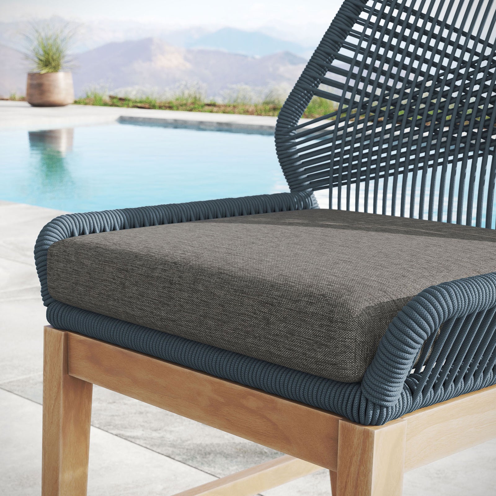 Cushioned counter stool seat with blue rope frame shown in an outdoor poolside setting. || EEI-7126-BLU-GPH || detail_room