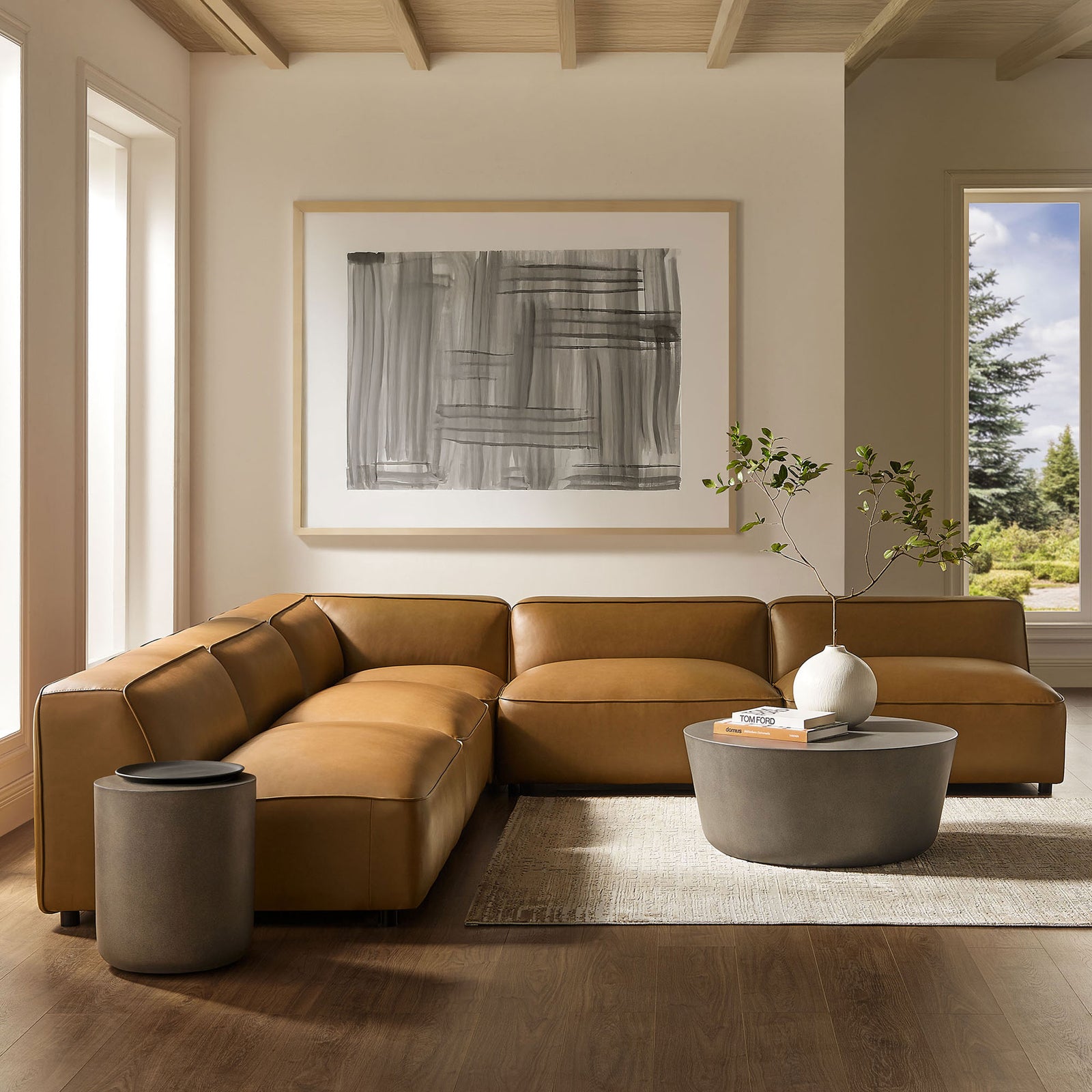 Camel vegan leather L shaped modular sofa anchors a bright living room with warm, contemporary style || EEI-7133-CAM || front_angle_room