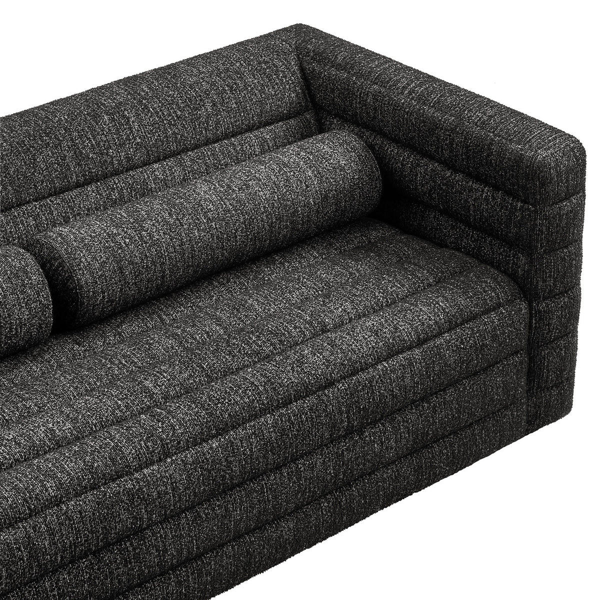 Charcoal boucle upholstery with channel tufting and smooth bolster pillow for a cozy textured Relle sofa seat || EEI-7136-CHA || detail_studio