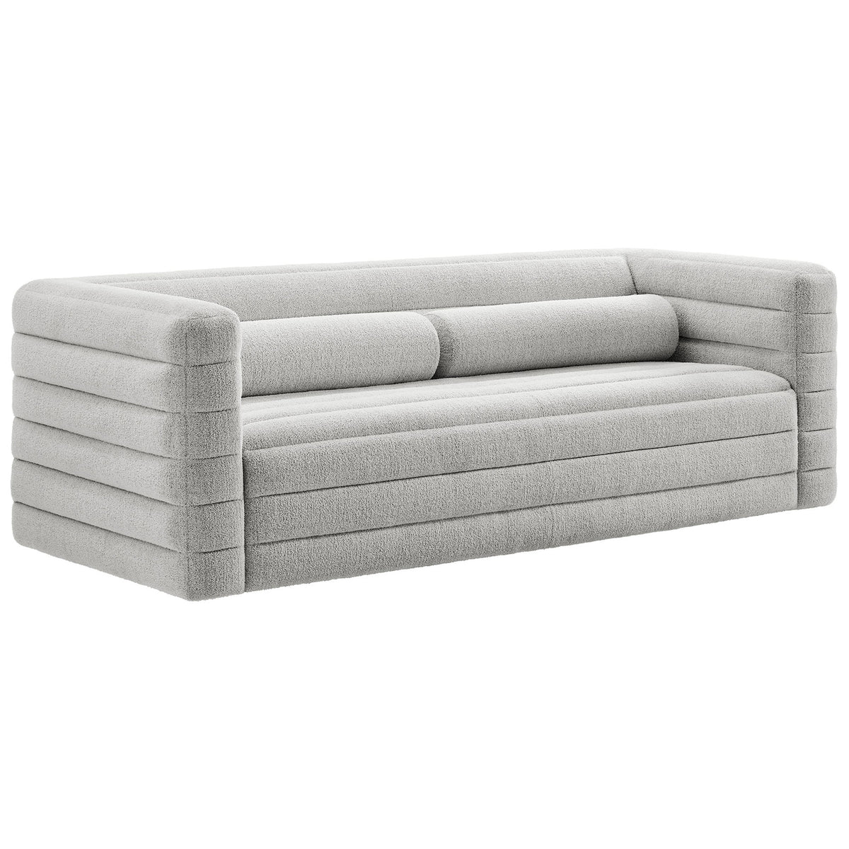 Modern boucle sofa showcasing its sculpted track arms, wraparound channel tufting, and deep cushioned seat || EEI-7136-NPT || front_angle_studio