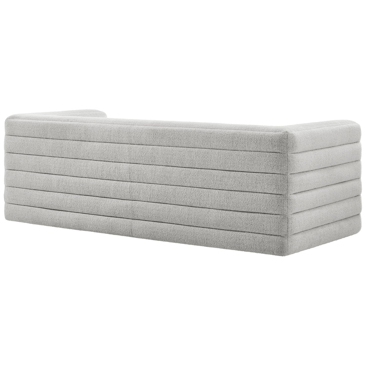 Back view of the Relle boucle sofa featuring seamless wraparound arms and continuous horizontal channel lines || EEI-7136-NPT || back_angle_studio