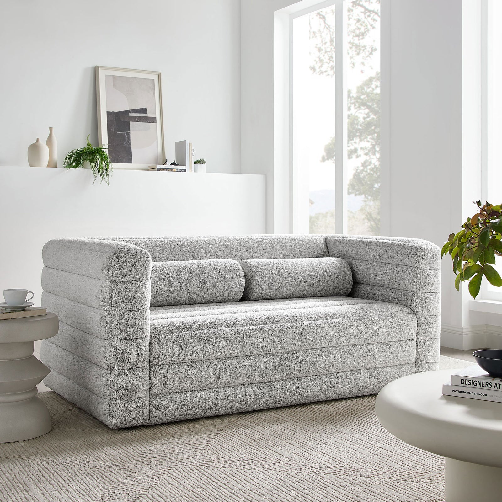 Relle channel-tufted boucle loveseat creating a cozy focal point in a light-filled contemporary living room. || EEI-7137-NPT || front_angle_room