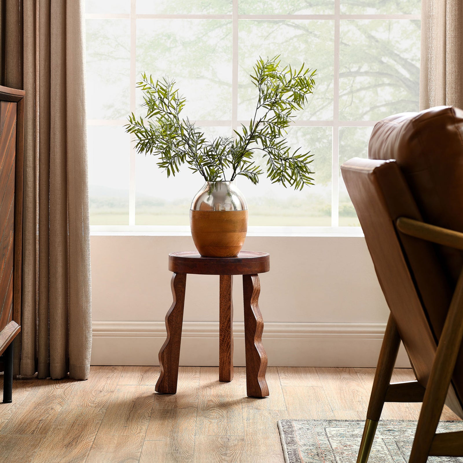 Wood stool displayed with a vase by a bright window in a modern room || EEI-7140-WAL || front_angle_room