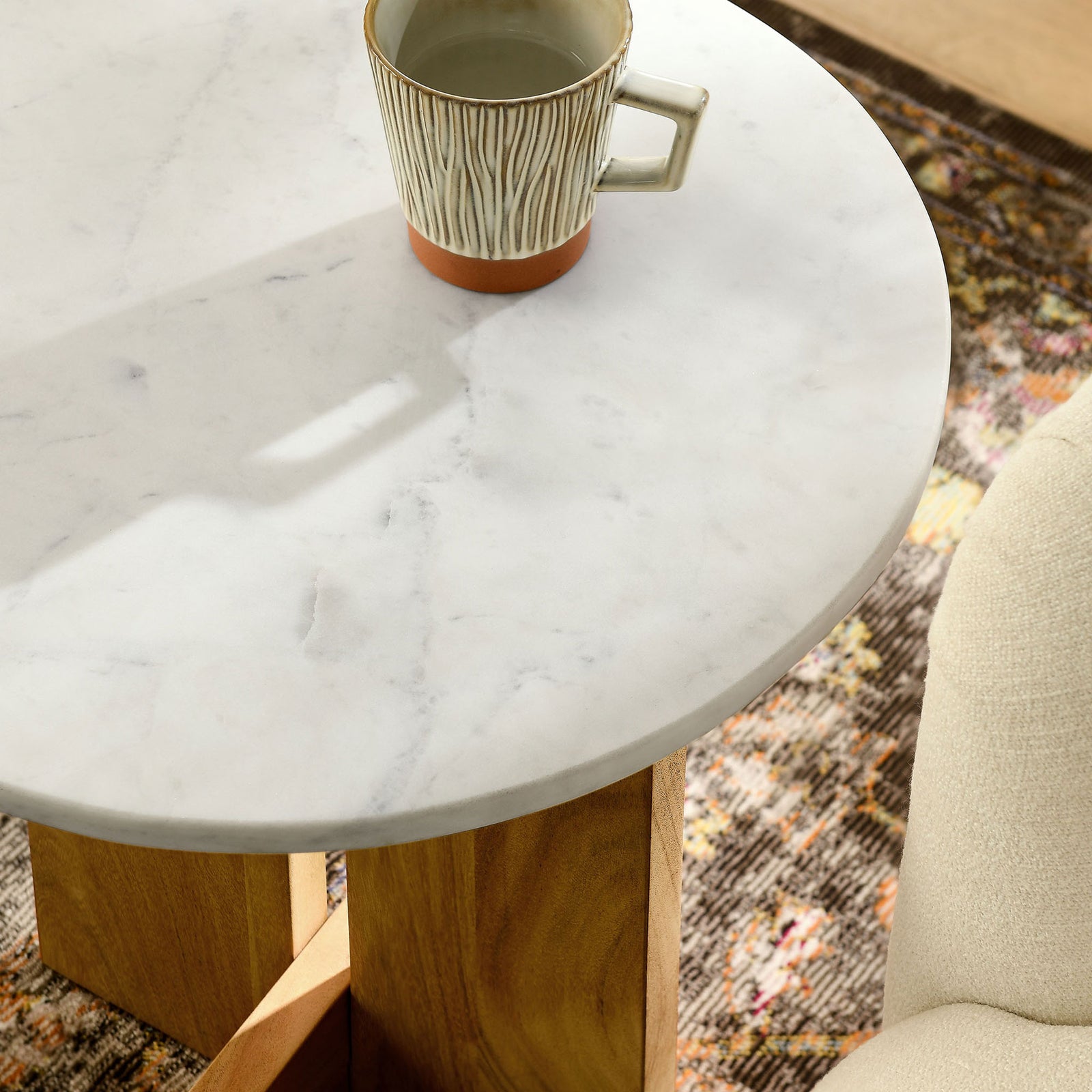 Marble side table styled with a mug, highlighting the spacious top and everyday use || EEI-7141-NAT || detail_room