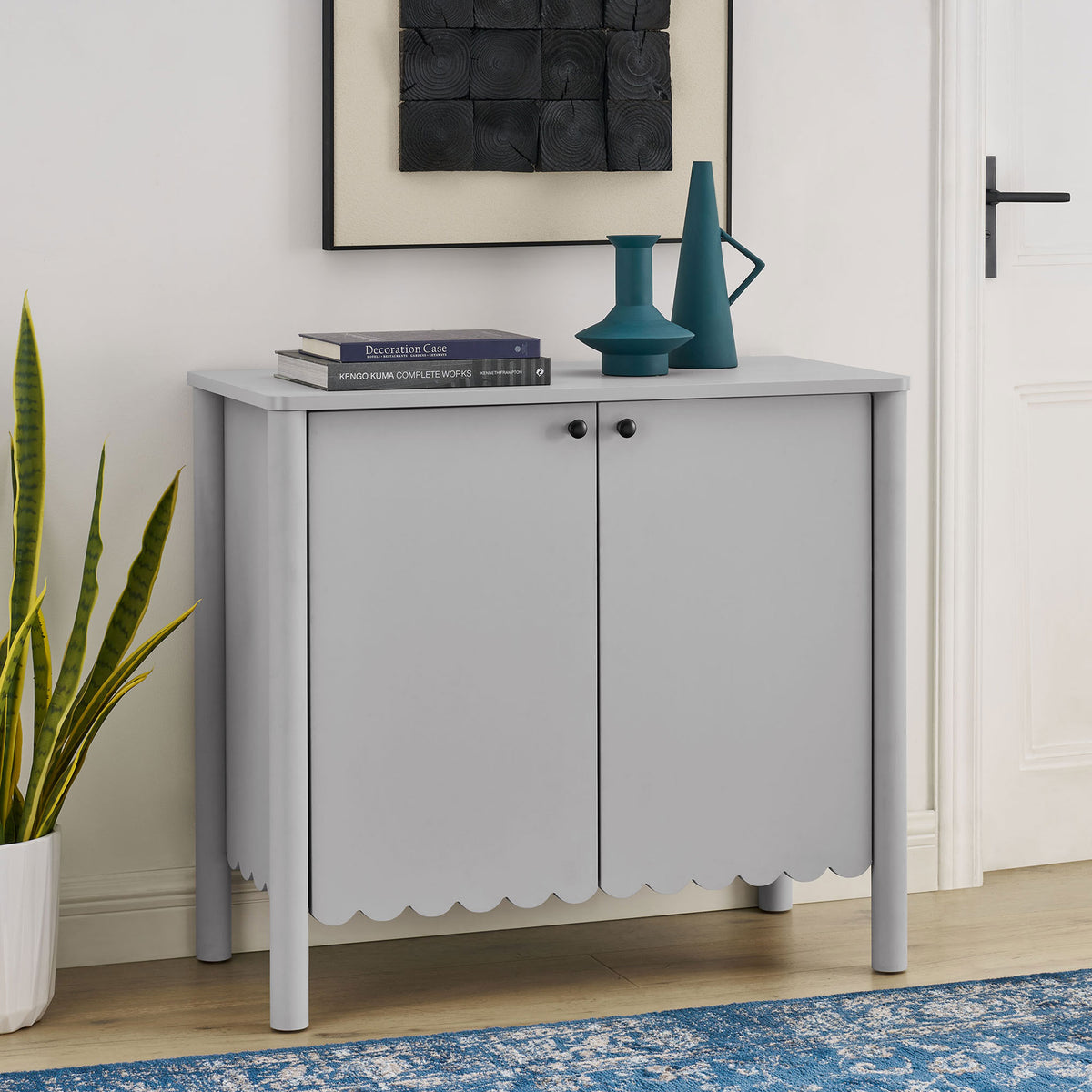 Light gray Emmeline cabinet adds sculpted storage and a clean, modern touch to an entry or living room || EEI-7152-LGR || front_angle_room