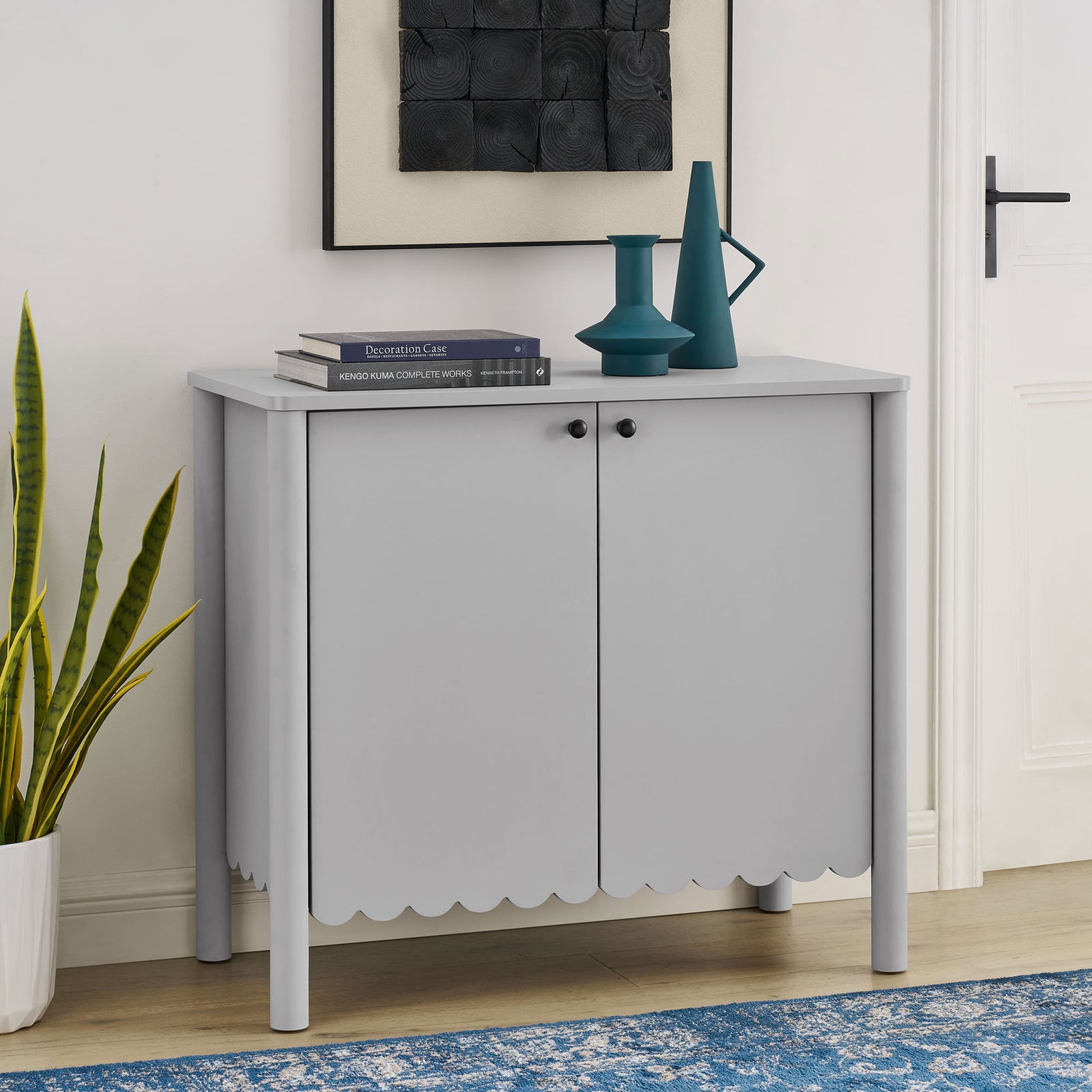Light gray Emmeline cabinet adds sculpted storage and a clean, modern touch to an entry or living room || EEI-7152-LGR || front_angle_room