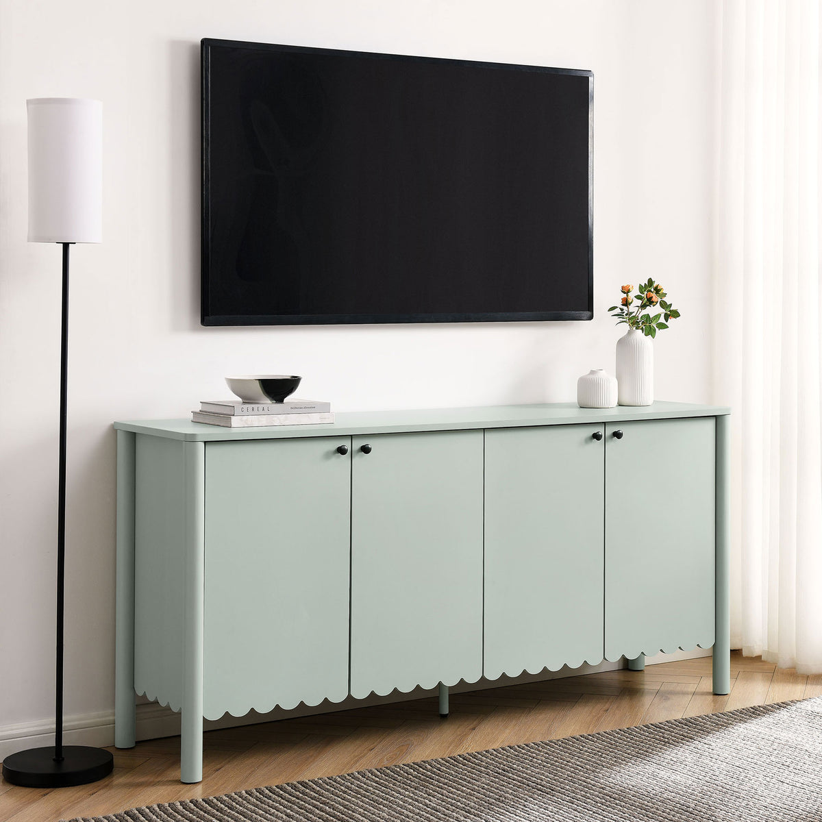 Sage green sideboard used as a media console beneath a wall-mounted TV || EEI-7153-SGE || front_angle_room