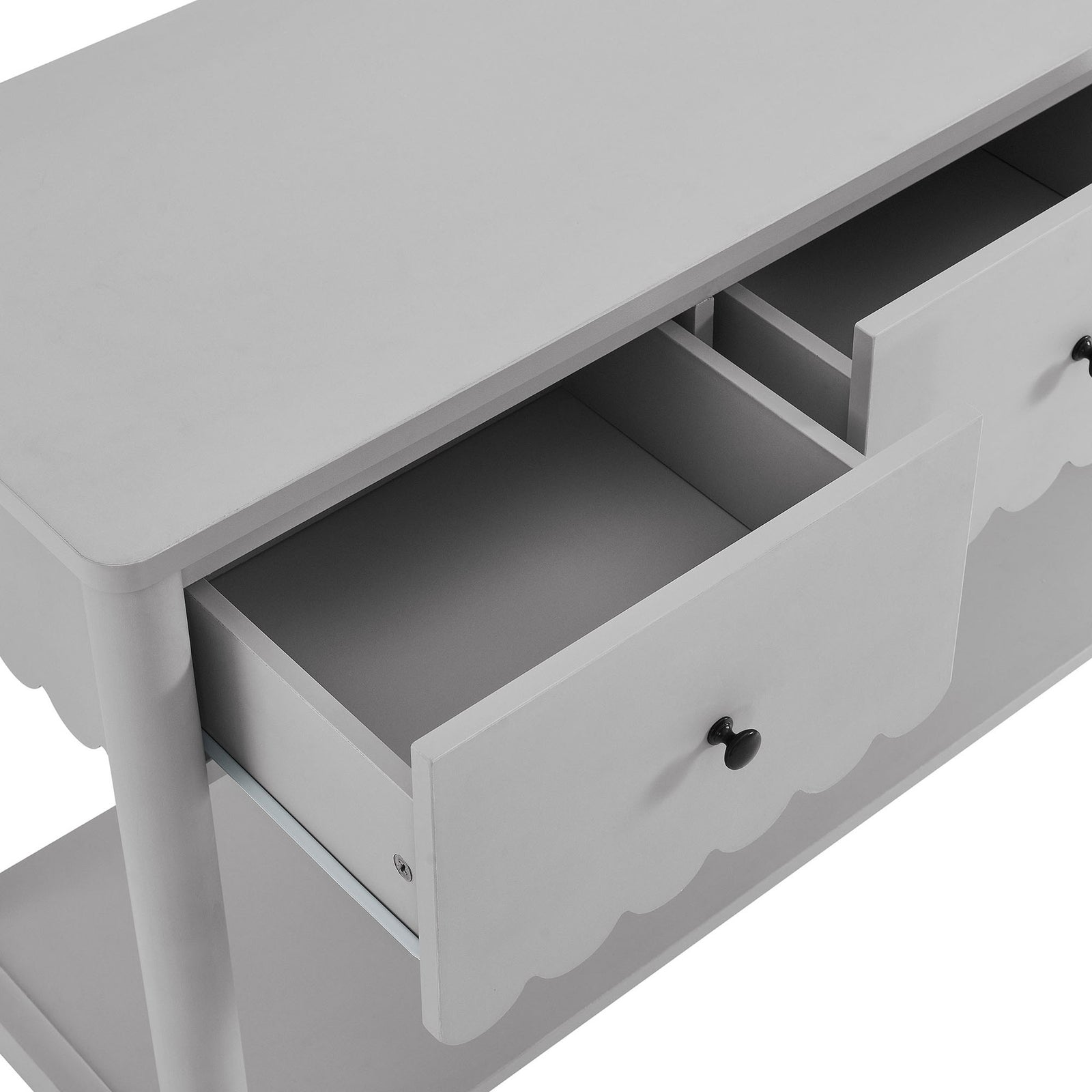 Full-extension drawers open smoothly to reveal generous storage, accented by simple round knobs || EEI-7154-LGR || storage_open_studio