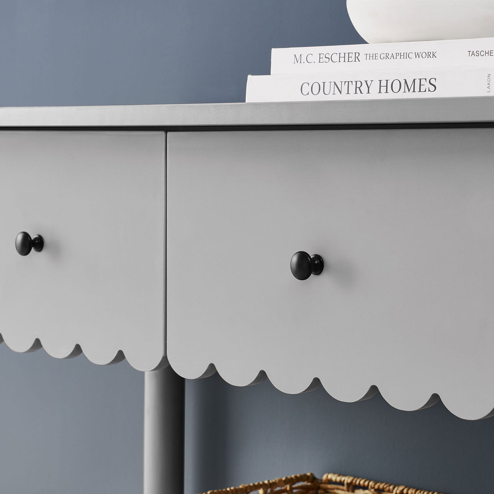 Scalloped edge detail and matte black knobs add playful charm to the light gray console || EEI-7154-LGR || storage_room
