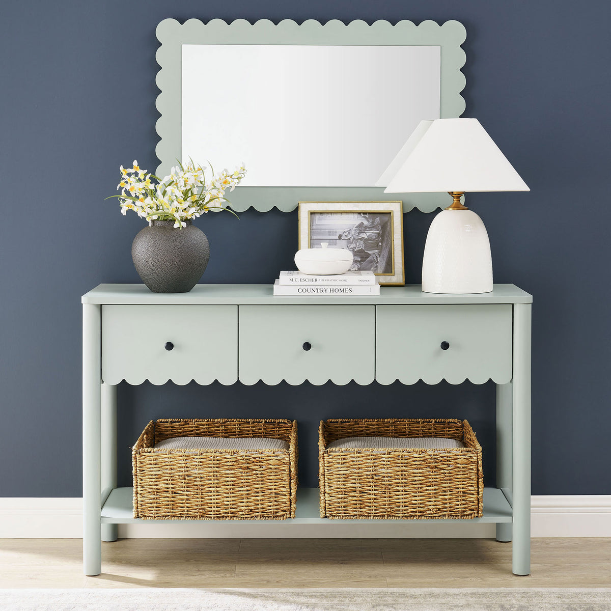 Farmhouse-inspired console blends scalloped charm with practical shelf space for baskets and decor. || EEI-7154-SGE || front_room