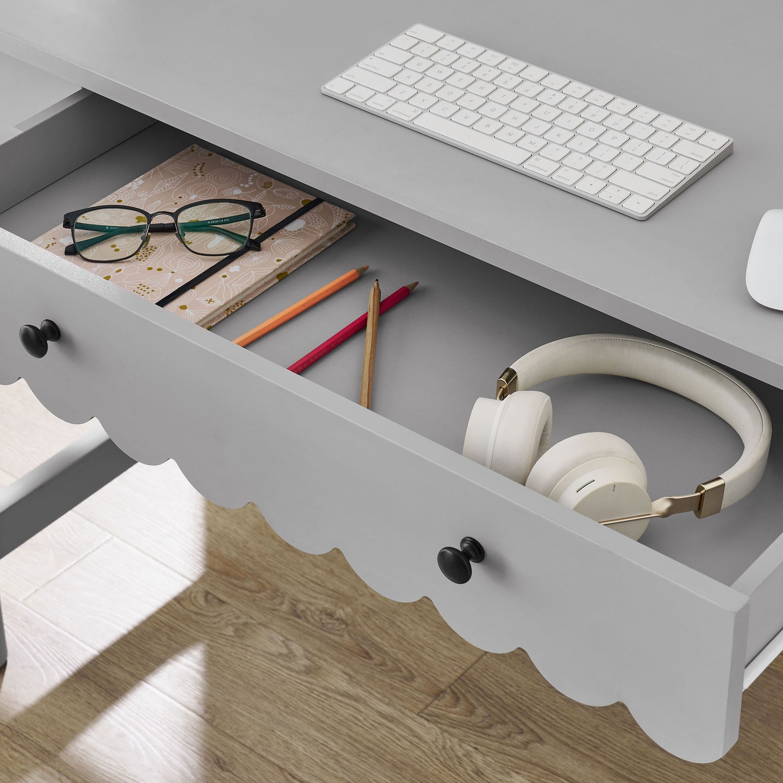 Spacious center drawer keeps tech, stationery, and accessories tidy during work or study || EEI-7155-LGR || storage_open_room